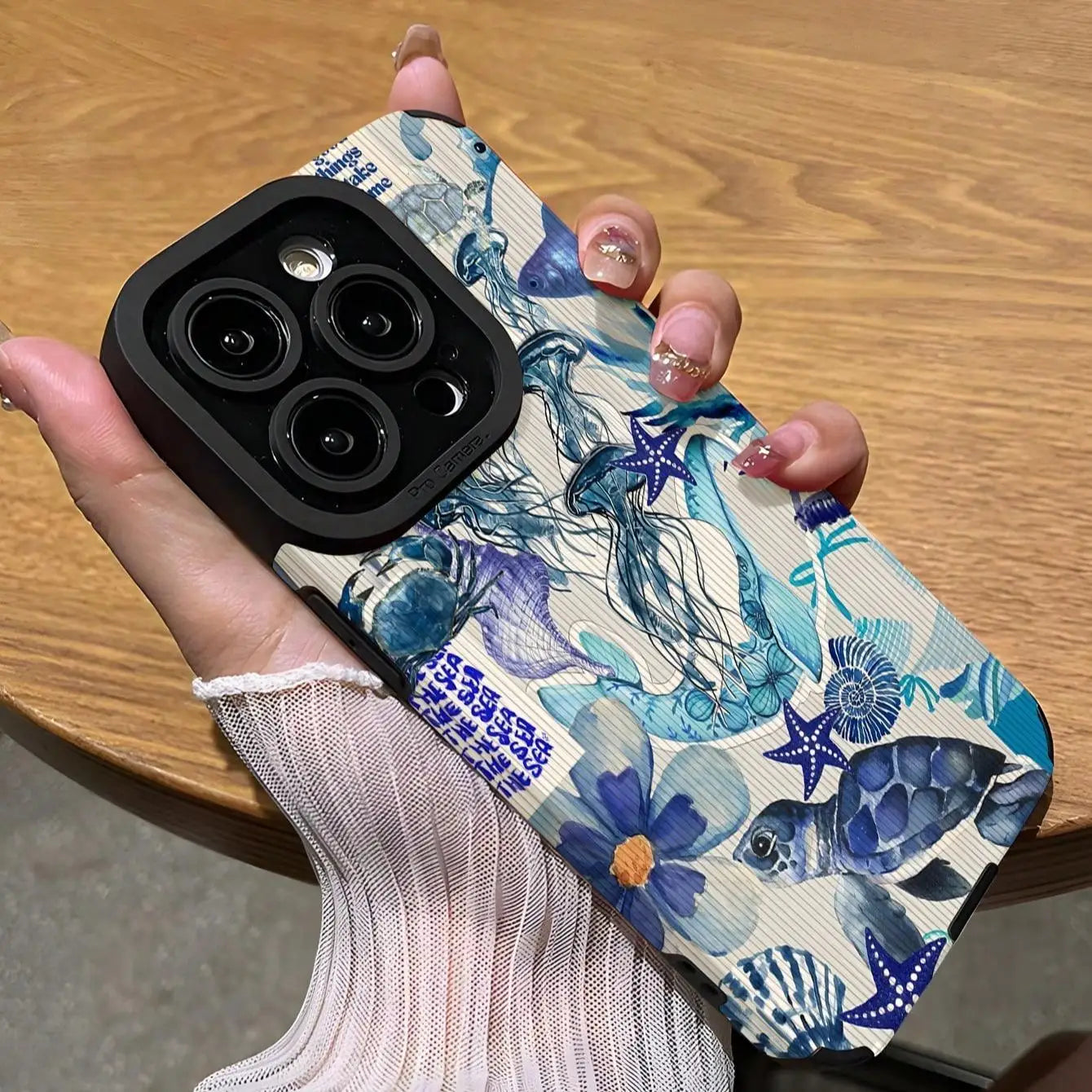 Fashion ocean theme phone case with sea creatures for iPhone.