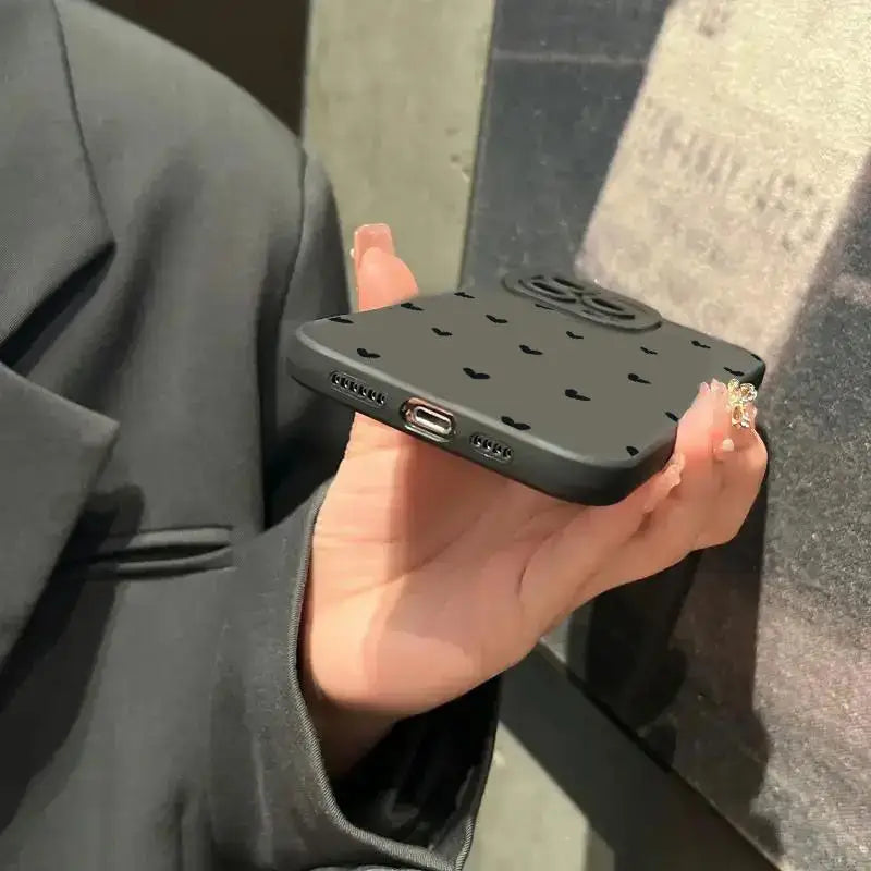 Black Love Heart phone case for iPhone models, featuring a shockproof silicone soft cover.