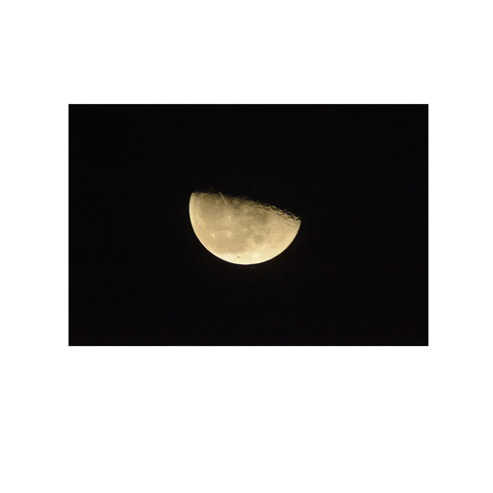 Lightdow 2X Teleconverter for T-Mount lenses capturing a clear image of the moon.