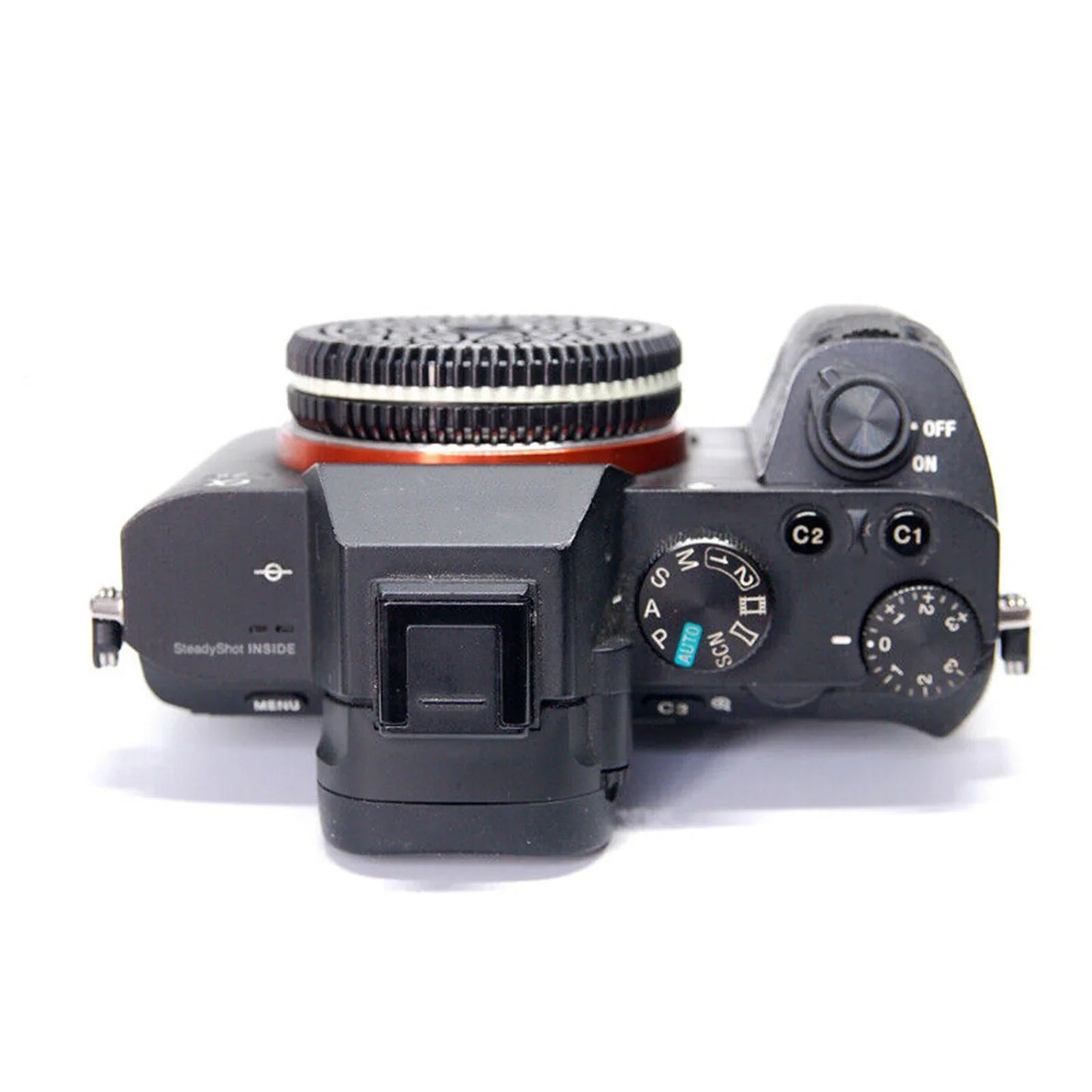 Sony E-mount mirrorless camera top view with focus free pancake biscuit lens attached, 150mm autofocus zoom lens for APS-C and full-frame cameras.