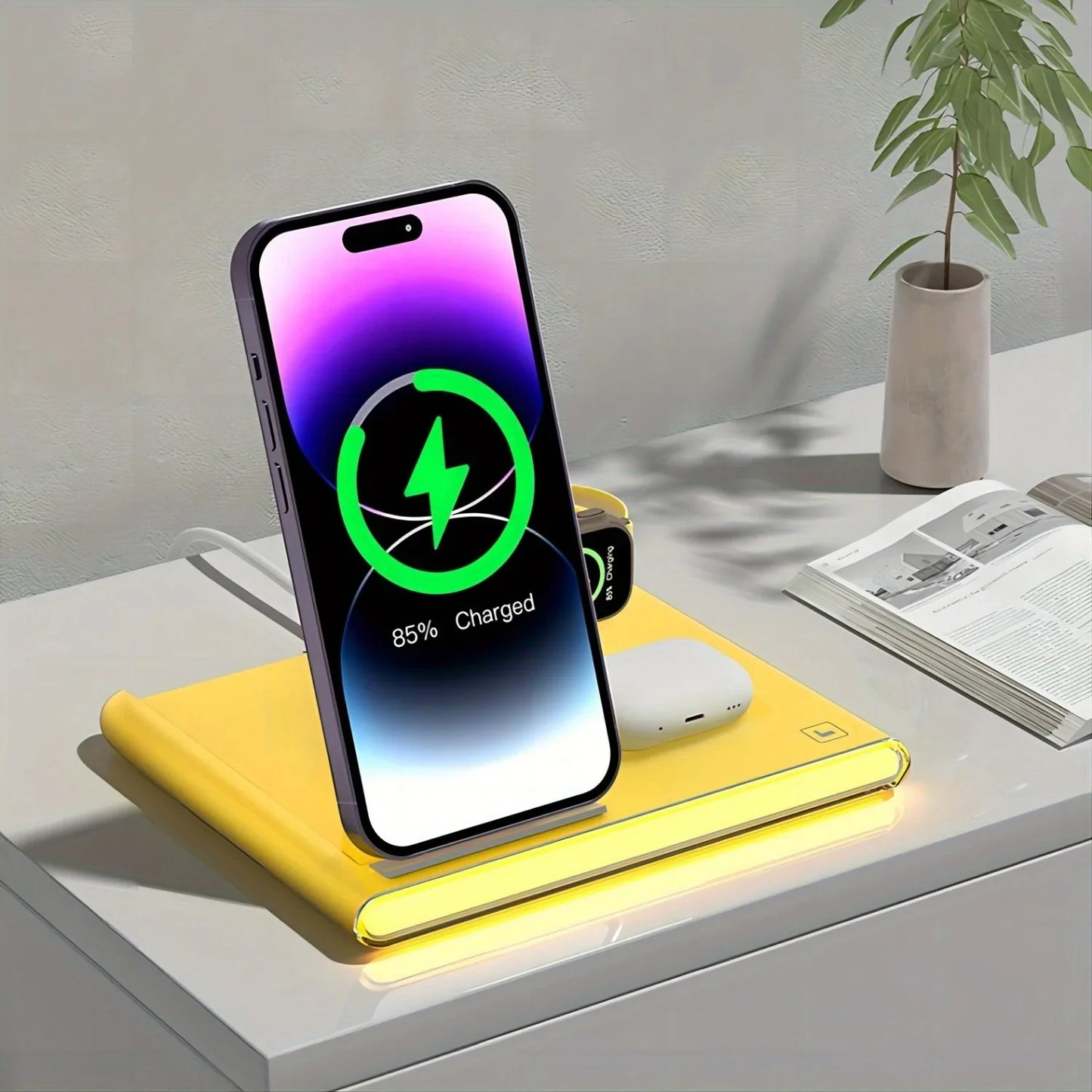 4-in-1 fast charging wireless station with phone, smart watch, and earphones on a table, featuring LED light and Type C connector.