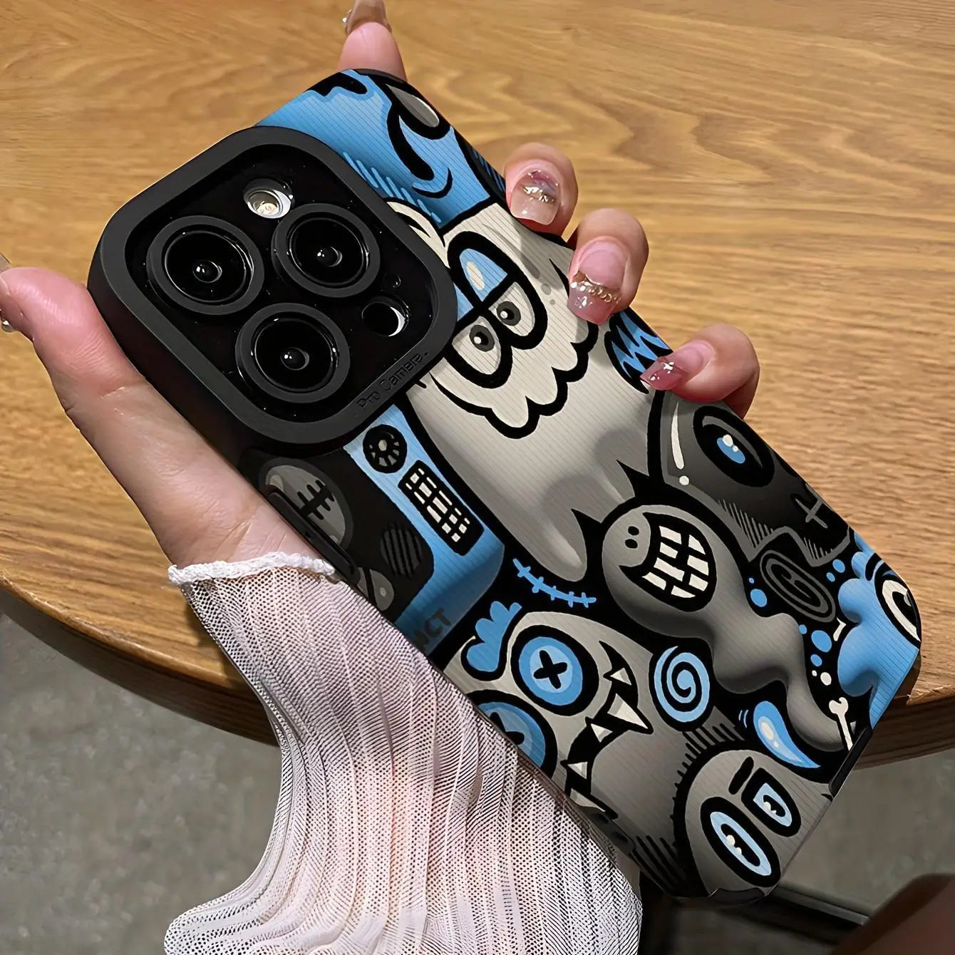 Cartoon graffiti phone case for iPhone 16 Pro Max to 11 with colorful design.