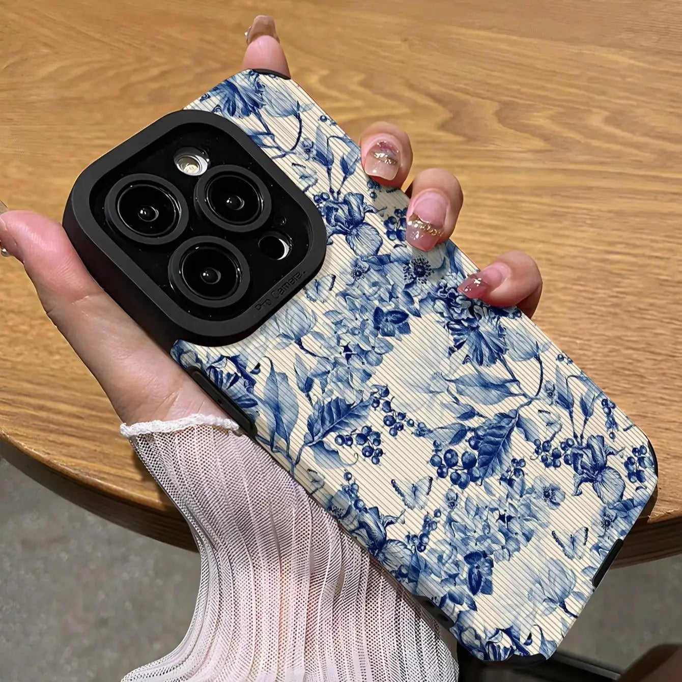 Floral pattern phone case for iPhone, decorative and protective cover.