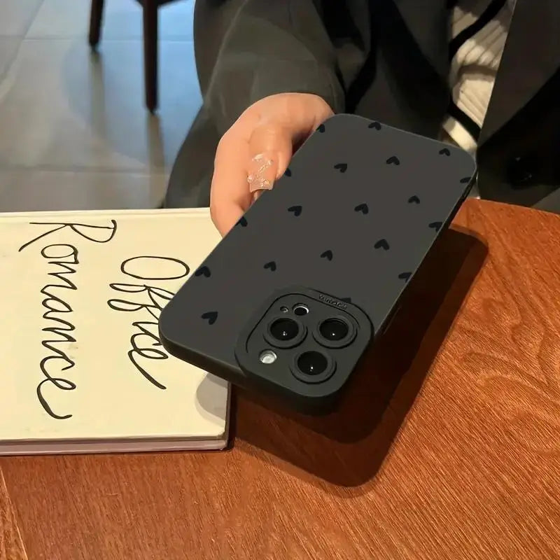 Black Love Heart shockproof silicone phone case for multiple iPhone models.