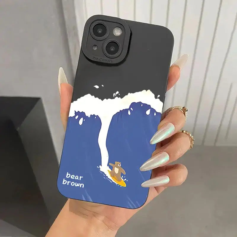 Cartoon surfing bear phone case for iPhone with wave design.