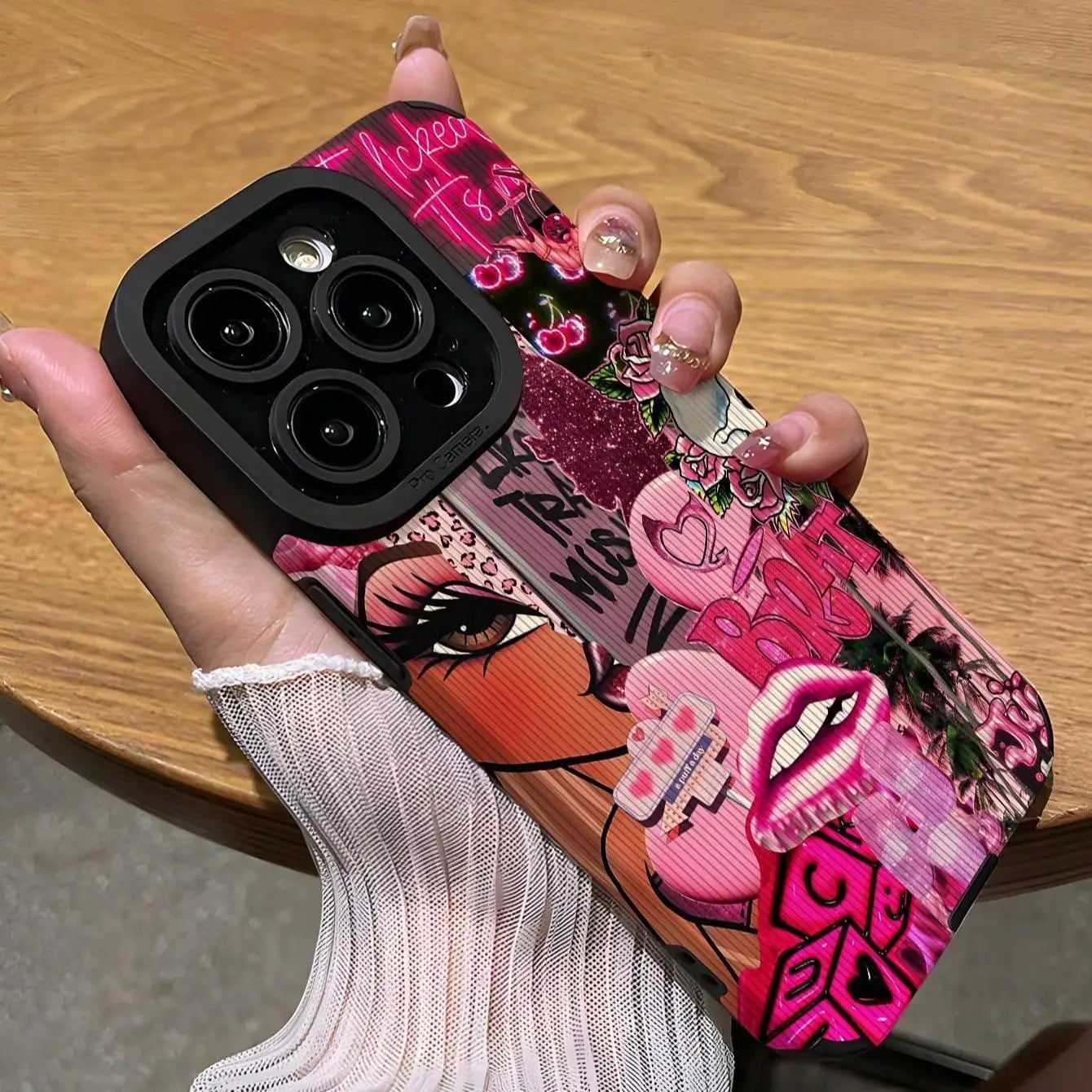 Fashion Graffiti Shockproof Phone Case for iPhone 16 Pro Max with vibrant design.