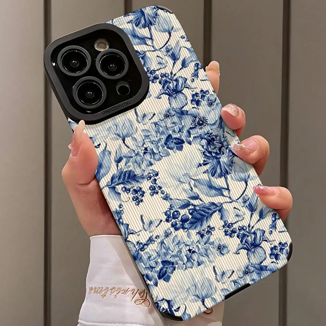 Floral pattern phone case compatible with iPhone 16 Pro Max.