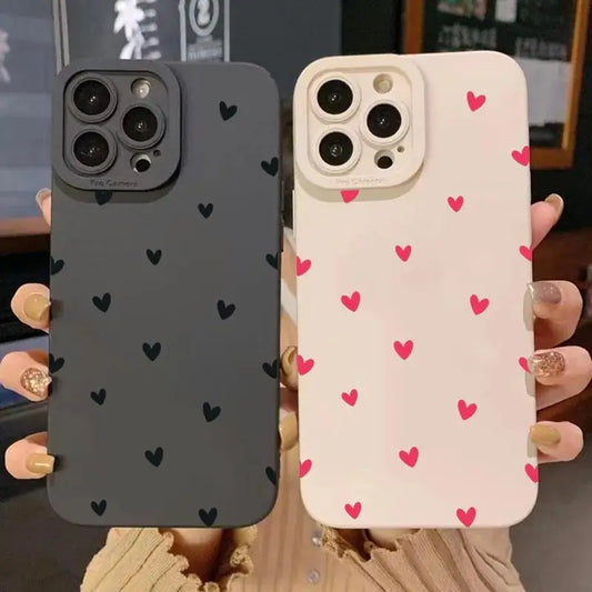 Black love heart phone case for iPhone in shockproof silicone covering, compatible with models 11 to 16 including Pro Max and SE.