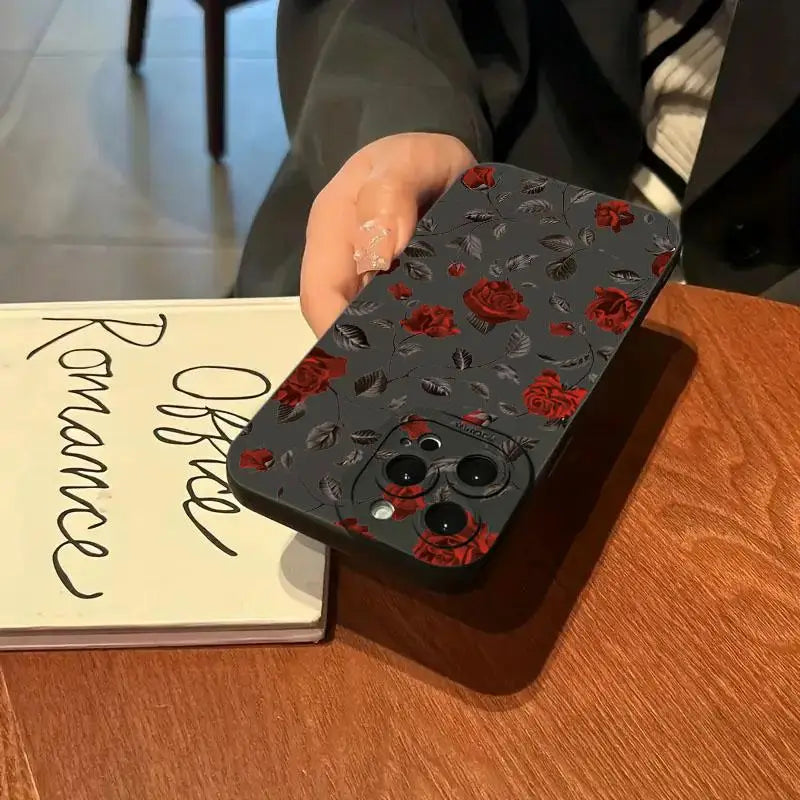 Retro Rose Shockproof Phone Case for iPhone 16 Pro Max to 12 on a wooden table.