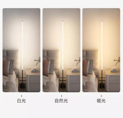 Dimmable corner floor lamp with smart LED mood lighting in bedroom setting.
