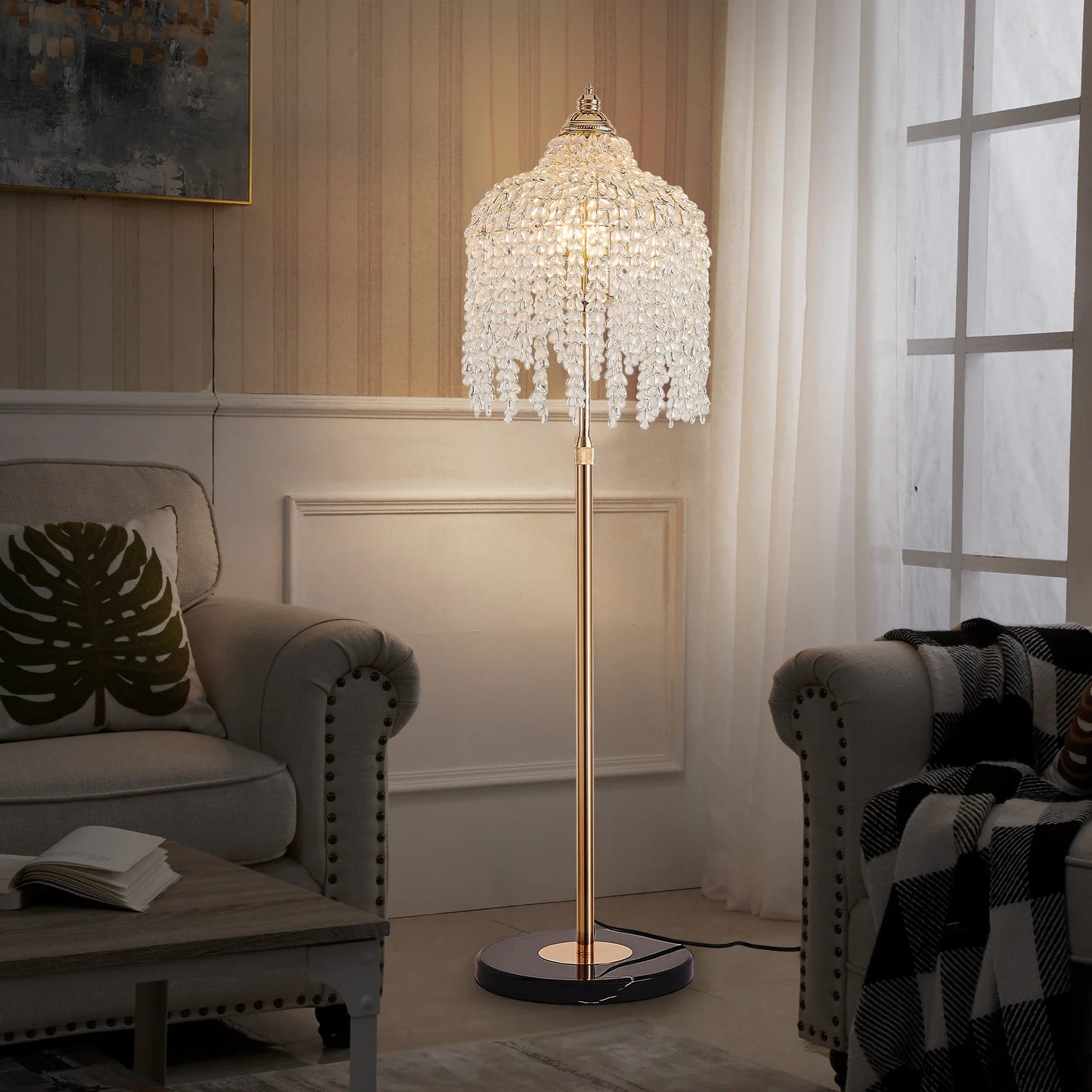 Elegant gold crystal floor lamp with marble base in modern living room setting